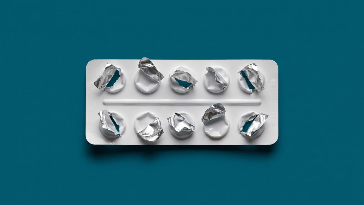 An empty blister pack with every foil bubble burst - the recurrent UTI antibiotic cycle - ADIRA